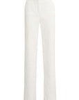 Pantalone dalla linea a palazzo in tessuto effetto stropicciato. - Monique Garçonne
