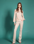 Pantalone dalla linea a zampetta in scuba con placcatura trasparente - Monique Garçonne