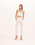 Pantalone dalla linea slim in tessuto effetto stropicciato. - Monique Garçonne