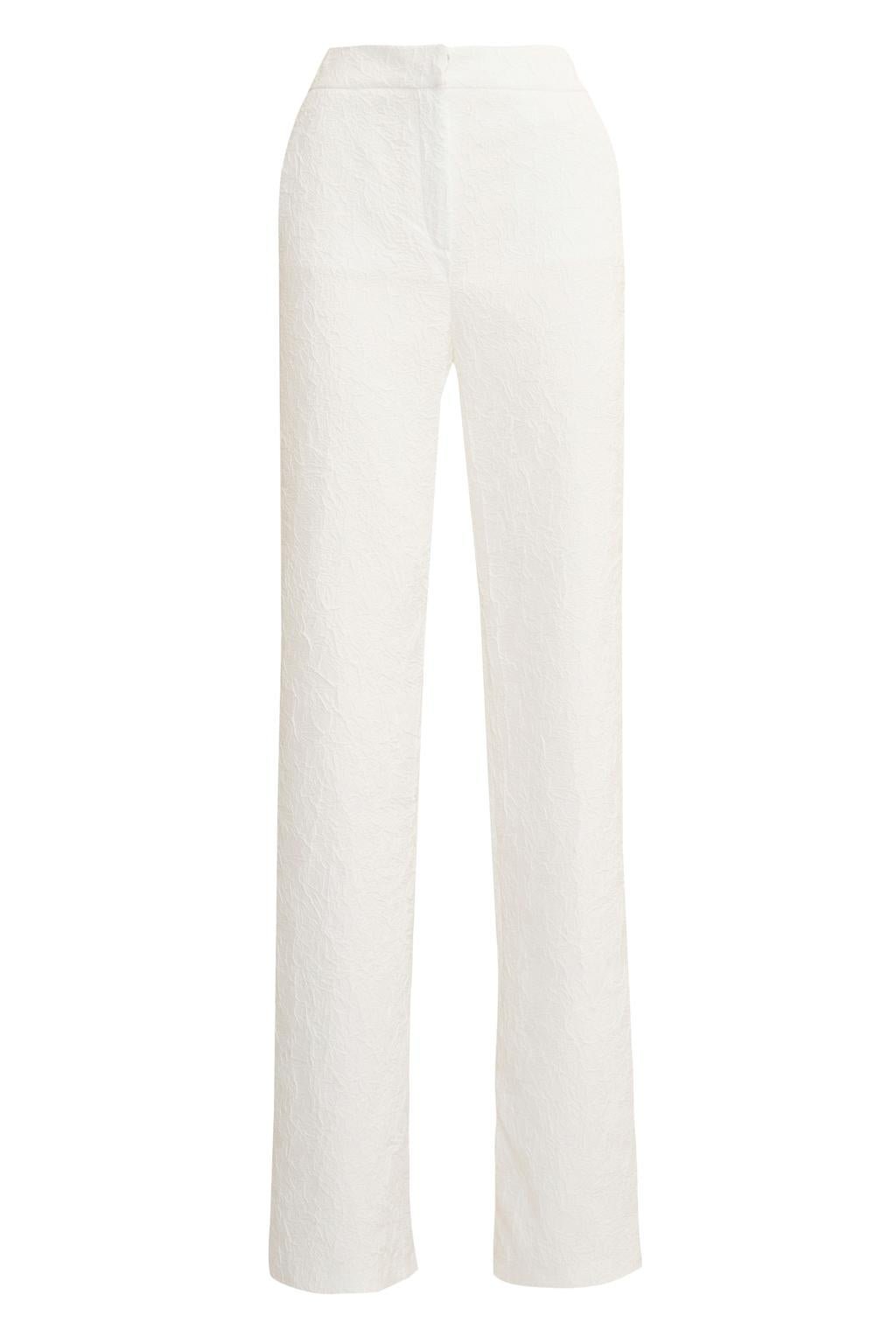 Pantalone dalla linea a palazzo in tessuto effetto stropicciato. - Monique Garçonne