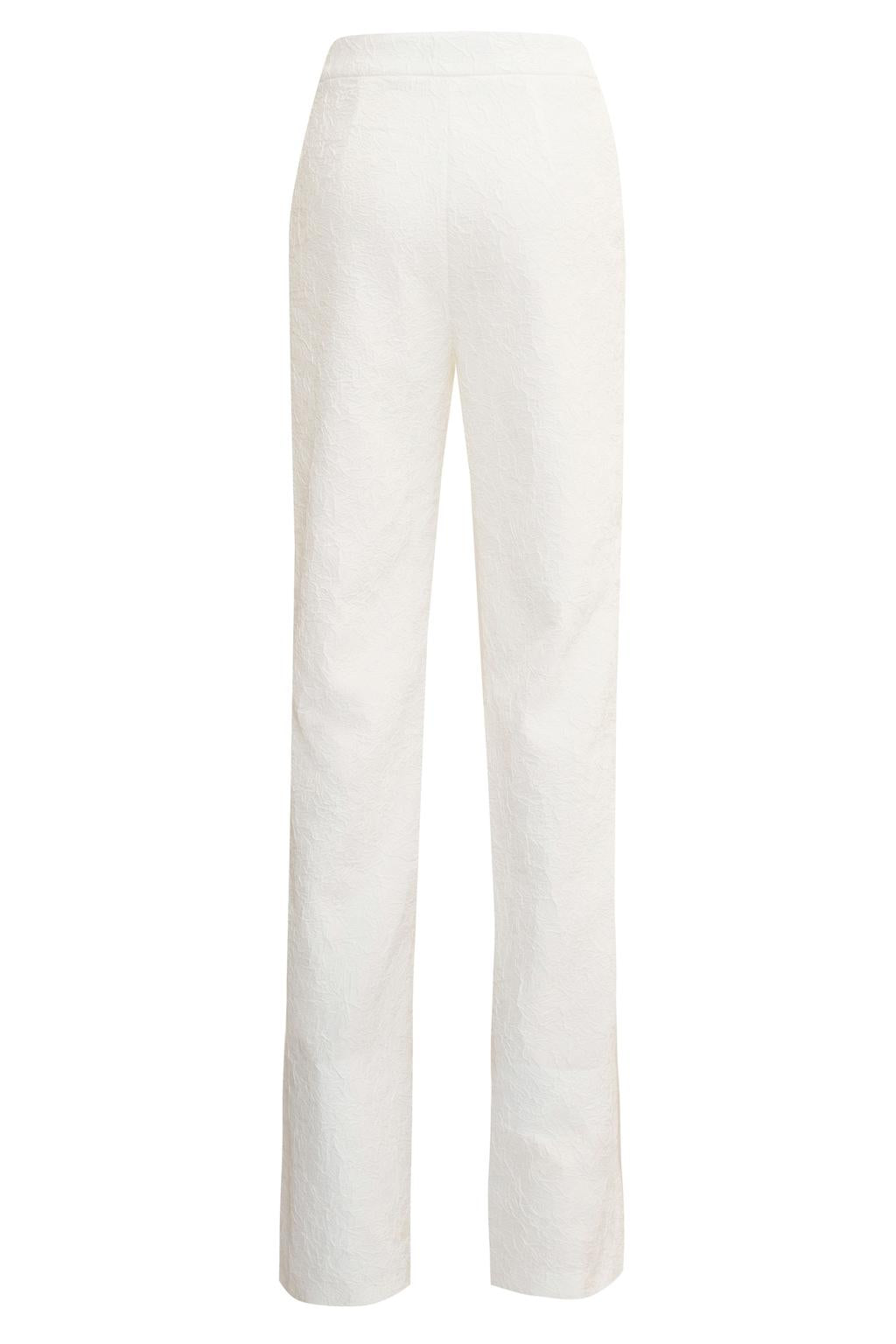 Pantalone dalla linea a palazzo in tessuto effetto stropicciato. - Monique Garçonne