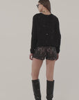 Maglia in mohair con micro paillettes